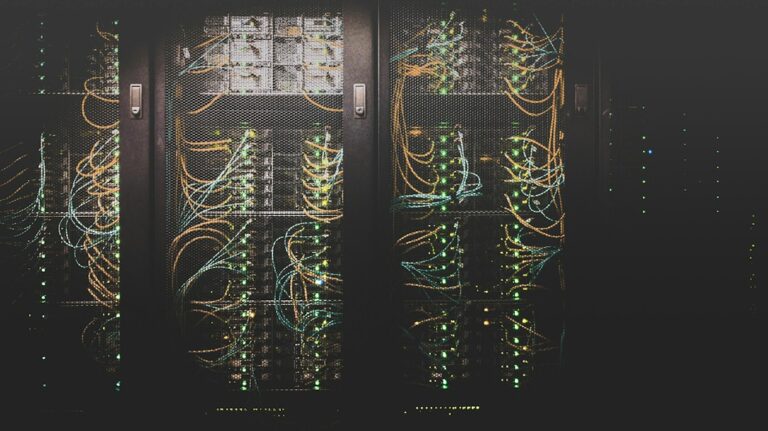 Network cabling and server infrastructure representing cloud computing, hosting and DevOps operations.